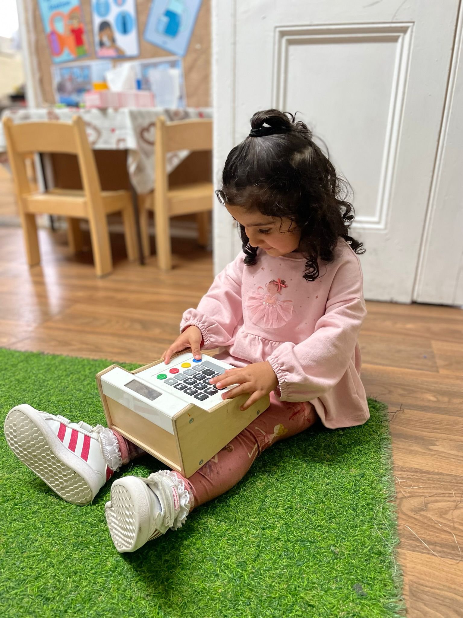 Children learning and playing at Blossoms Harlow